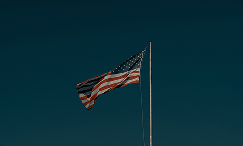 American flag blowing in wind